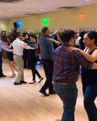 Instructors leading a group class